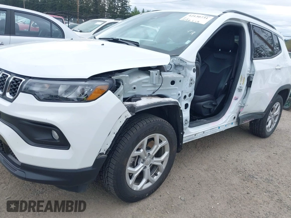 2024 Jeep Compass Latitude with VIN 3C4NJDBN7RT118288, listed as a IAAI auction lot 42130731 with 25,728 mi miles and . Bid and sale history available at carsss.com. Image 6.