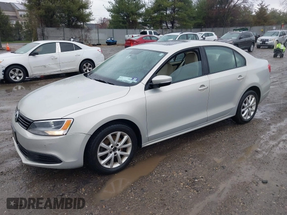 2011 Volkswagen Jetta SE with VIN 3VWDZ7AJ4BM387236, listed as a IAAI auction lot 41875995 with 202,028 mi miles and . Bid and sale history available at DreamBid. Image 2.