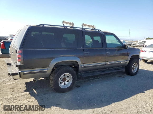 1999 Chevrolet Suburban with VIN 1GNGK26R5XJ513945, listed as a Copart auction lot 73673314 with 198,656 mi miles and Clean Title. Bid and sale history available at carsss.com. Image 3.