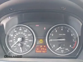 2007 BMW 3 Series 335i with VIN WBAWL73547PX47052, listed as a IAAI auction lot 41700828 with 64,409 mi miles. Bid and sale history available at carsss.com. Image 7.