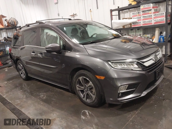 2018 Honda Odyssey Touring with VIN 5FNRL6H84JB041309, listed as a IAAI auction lot 42272247 with 90,371 mi miles and . Bid and sale history available at DreamBid. Image 1.