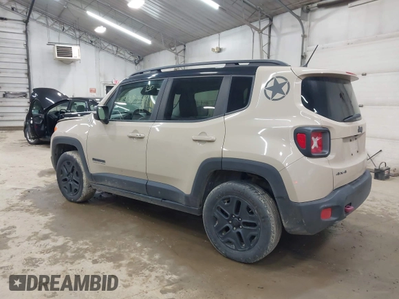 2017 Jeep Renegade Trailhawk z VIN ZACCJBCB6HPE97998, wystawiony jako IAAI lot #42435849 z przebiegiem 105 490 mil mil oraz . Historia ofert i sprzedaży dostępna na DreamBid. Obrazek 3.