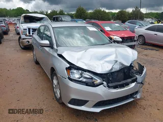 2019 Nissan Sentra S z VIN 3N1AB7AP4KY447641, wystawiony jako IAAI lot #42007796 z przebiegiem 81 953 mil mil oraz . Historia ofert i sprzedaży dostępna na DreamBid. Obrazek 1.