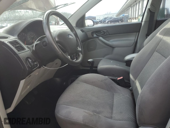 2007 Ford Focus S z VIN 1FAHP37N17W157941, wystawiony jako Copart lot #86057694 z przebiegiem 117 658 mil mil oraz Szkoda całkowita • Salvage title. Historia ofert i sprzedaży dostępna na DreamBid. Obrazek 7.