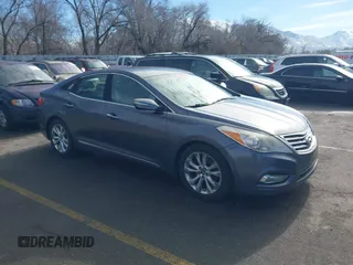 2012 Hyundai Azera with VIN KMHFG4JG9CA149848, listed as a IAAI auction lot 41658387 with 164,933 mi miles. Bid and sale history available at carsss.com. Image 1.
