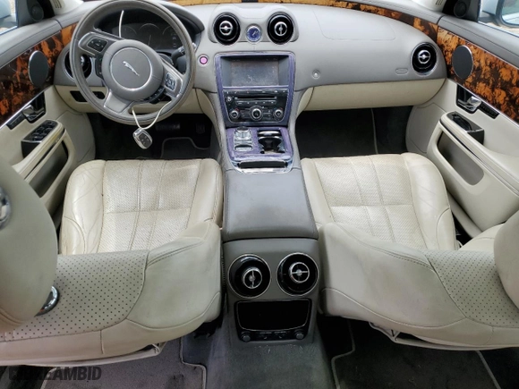 2011 Jaguar XJ with VIN SAJWA1CB9BLV05595, listed as a Copart auction lot 54947855 with 39,516 mi miles and Salvage Title. Bid and sale history available at carsss.com. Image 8.