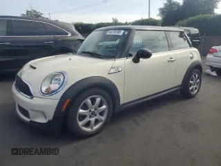 2010 MINI Hardtop S with VIN WMWMF7C59ATZ69213, listed as a Copart auction lot 54270705 with 77,594 mi miles and Salvage Title. Bid and sale history available at DreamBid. Image 1.