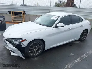 2019 Alfa Romeo Giulia with VIN ZARFAMANXK7600498, listed as a IAAI auction lot 41777643 with 100,492 mi miles. Bid and sale history available at carsss.com. Image 2.