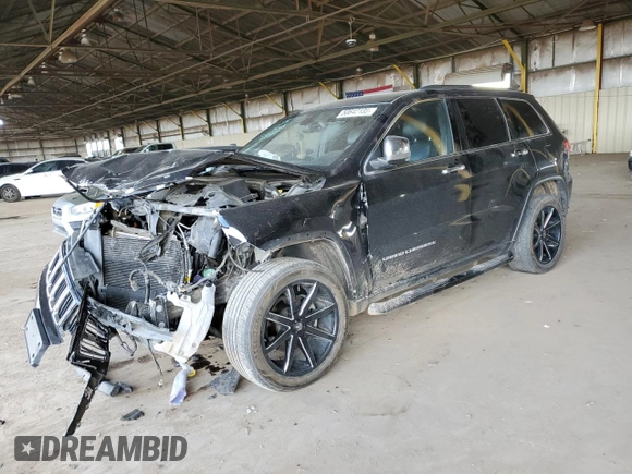2015 Jeep Grand Cherokee Limited with VIN 1C4RJEBG7FC217855, listed as a Copart auction lot 50642135 with 124,130 mi miles and Salvage Title. Bid and sale history available at carsss.com. Image 1.