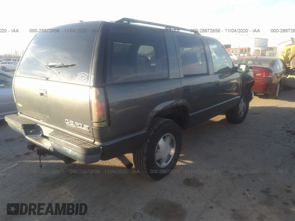 1999 Chevrolet Tahoe Z71 with VIN 1GNEK13R7XJ528100, listed as a IAAI auction lot 28872658 with 158,958 mi miles and . Bid and sale history available at DreamBid. Image 4.