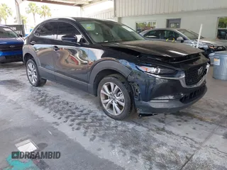 2023 Mazda CX-30 S Premium z VIN 3MVDMBDM1PM537755, wystawiony jako IAAI lot #42385160 z przebiegiem 26 425 mil mil oraz . Historia ofert i sprzedaży dostępna na DreamBid. Obrazek 1.