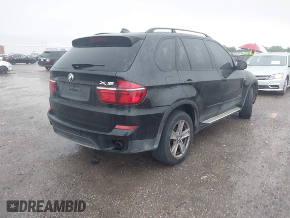 2013 BMW X5 xDrive35i z VIN 5UXZV4C53D0B23239, wystawiony jako IAAI lot #42200152 z przebiegiem 173 463 mil mil oraz . Historia ofert i sprzedaży dostępna na DreamBid. Obrazek 4.