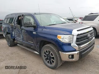 2014 Toyota Tundra 4WD Truck SR with VIN 5TFUY5F1XEX352184, listed as a IAAI auction lot 40732632 with 107,262 mi miles. Bid and sale history available at carsss.com. Image 1.
