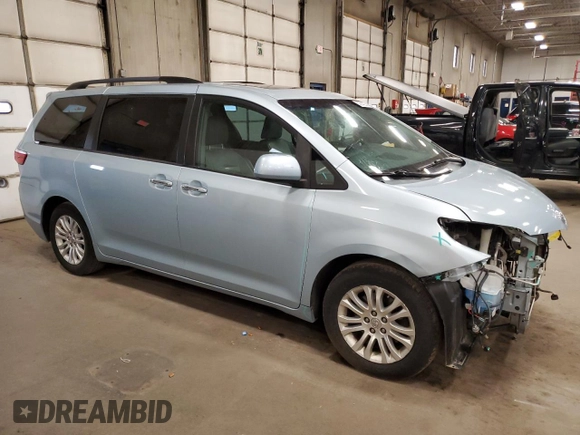 2015 Toyota Sienna XLE with VIN 5TDYK3DC1FS529806, listed as a Copart auction lot 52364225 with 180,172 mi miles and Non Repairable. Bid and sale history available at DreamBid. Image 4.