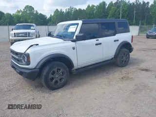 2021 Ford Bronco with VIN 1FMDE5BH6MLA80102, listed as a IAAI auction lot 42126680 with 67,913 mi miles and . Bid and sale history available at DreamBid. Image 2.