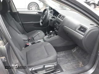 2015 Volkswagen Jetta SE z VIN 3VWD17AJ5FM285988, wystawiony jako IAAI lot #42675179 z przebiegiem 150 815 mil mil oraz . Historia ofert i sprzedaży dostępna na DreamBid. Obrazek 5.