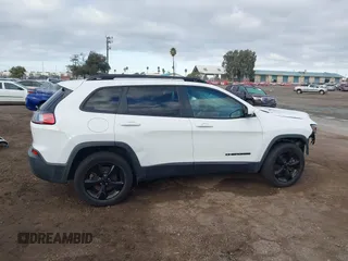 2019 Jeep Cherokee Latitude Plus with VIN 1C4PJMLB9KD453979, listed as a IAAI auction lot 41413997 with 70,664 mi miles and . Bid and sale history available at DreamBid. Image 14.
