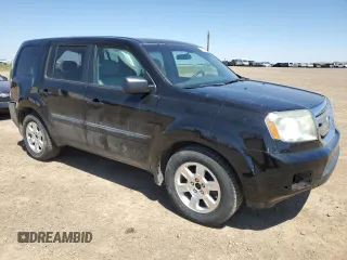 2011 Honda Pilot LX with VIN 5FNYF4H20BB502574, listed as a Copart auction lot 59156775 with 269,212 mi miles and Salvage title. Bid and sale history available at DreamBid. Image 4.