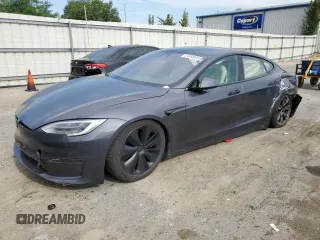 2022 Tesla Model S with VIN 5YJSA1E5XNF471212, listed as a Copart auction lot 57384025 with Not provided miles and Salvage title. Bid and sale history available at DreamBid. Image 1.