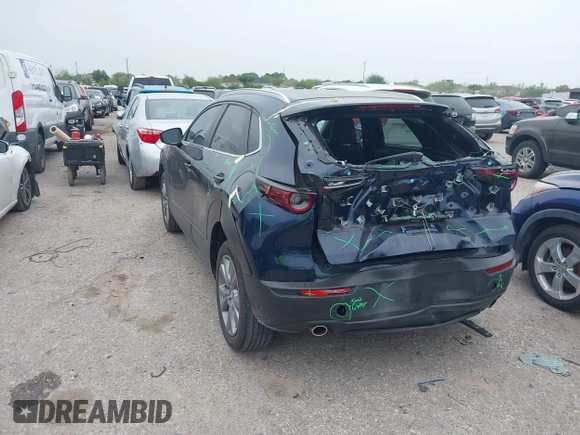 2023 Mazda CX-30 S Carbon Edition with VIN 3MVDMBCM1PM520066, listed as a IAAI auction lot 41877916 with 22,973 mi miles and . Bid and sale history available at carsss.com. Image 3.