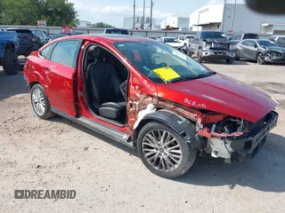 2018 Ford Focus Titanium with VIN 1FADP3J20JL281141, listed as a IAAI auction lot 42437424 with 113,499 mi miles and . Bid and sale history available at DreamBid. Image 1.