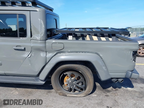 2022 Jeep Gladiator High Altitude with VIN 1C6HJTFG6NL152173, listed as a IAAI auction lot 42524638 with 17,148 mi miles and . Bid and sale history available at DreamBid. Image 20.