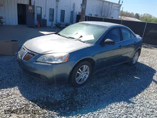 2006 Pontiac G6 6-Cyl with VIN 1G2ZG558564236485, listed as a IAAI auction lot 41846003 with 187,529 mi miles. Bid and sale history available at carsss.com. Image 2.