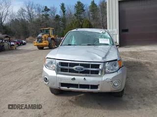 2010 Ford Escape Hybrid z VIN 1FMCU5K33AKC89835, wystawiony jako IAAI lot #41915349 z przebiegiem 125 659 mil mil oraz . Historia ofert i sprzedaży dostępna na DreamBid. Obrazek 12.