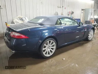 2007 Jaguar XK with VIN SAJDA44BX75B00447, listed as a Copart auction lot 50147695 with 119,467 mi miles and Salvage Title. Bid and sale history available at carsss.com. Image 3.