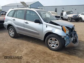 2002 Toyota RAV4 with VIN JTEGH20V826010656, listed as a IAAI auction lot 42589932 with 83,007 mi miles and . Bid and sale history available at DreamBid. Image 1.