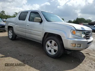 2014 Honda Ridgeline RTL with VIN 5FPYK1F58EB012869, listed as a Copart auction lot 51854995 with 318,950 mi miles and Salvage title. Bid and sale history available at DreamBid. Image 4.