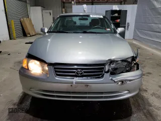 2001 Toyota Camry CE z VIN JT2BG28K810573972, wystawiony jako Copart lot #51733485 z przebiegiem 143 665 mil mil oraz Szkoda całkowita • Salvage title. Historia ofert i sprzedaży dostępna na DreamBid. Obrazek 5.