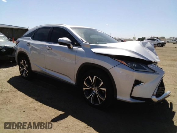 2017 Lexus RX 350 with VIN 2T2BZMCA9HC101738, listed as a Copart auction lot 53574575 with 136,677 mi miles and Salvage title. Bid and sale history available at DreamBid. Image 4.