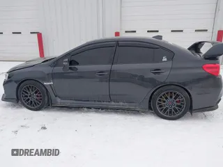 2015 Subaru WRX STI with VIN JF1VA2L60F9803514, listed as a IAAI auction lot 41591735 with 82,700 mi miles and . Bid and sale history available at DreamBid. Image 14.