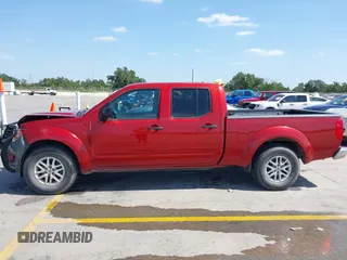 2014 Nissan Frontier SV z VIN 1N6AD0FR1EN766633, wystawiony jako IAAI lot #42453514 z przebiegiem 96 811 mil mil oraz . Historia ofert i sprzedaży dostępna na DreamBid. Obrazek 14.