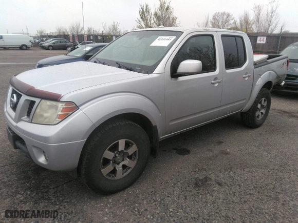 2011 Nissan Frontier PRO-4X with VIN 1N6AD0EV2BC438370, listed as a IAAI auction lot 41952484 with 217,529 mi miles. Bid and sale history available at carsss.com. Image 2.