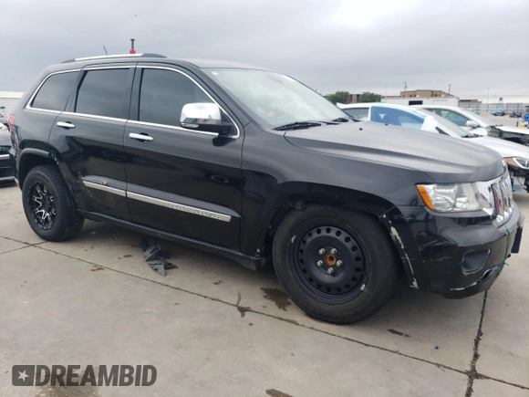 2013 Jeep Grand Cherokee Overland with VIN 1C4RJECG5DC528650, listed as a Copart auction lot 51581684 with 141,050 mi miles and Clean Title. Bid and sale history available at carsss.com. Image 4.