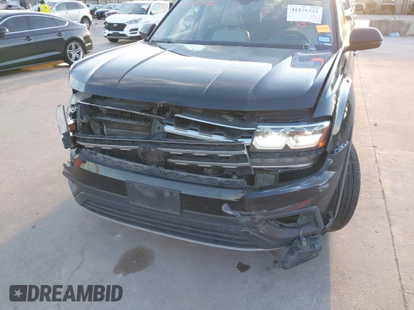 2018 Volkswagen Atlas SE with VIN 1V2DR2CA8JC536295, listed as a IAAI auction lot 41275322 with 166,684 mi miles and . Bid and sale history available at DreamBid. Image 6.