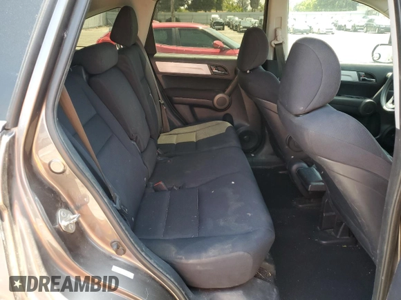 2010 Honda CR-V LX z VIN 5J6RE3H38AL034061, wystawiony jako Copart lot #54978905 z przebiegiem 154 951 mil mil oraz Szkoda całkowita • Salvage title. Historia ofert i sprzedaży dostępna na DreamBid. Obrazek 10.