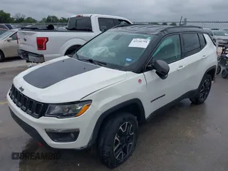 2020 Jeep Compass Trailhawk z VIN 3C4NJDDB6LT126585, wystawiony jako IAAI lot #42210794 z przebiegiem 132 220 mil mil oraz . Historia ofert i sprzedaży dostępna na DreamBid. Obrazek 6.