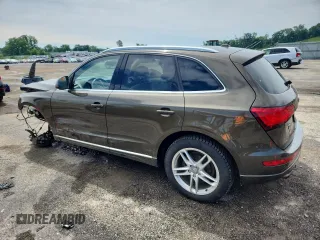 2014 Audi Q5 Premium Plus with VIN WA1LFAFP1EA026298, listed as a Copart auction lot 61729075 with 124,165 mi miles and Non repairable. Bid and sale history available at DreamBid. Image 2.