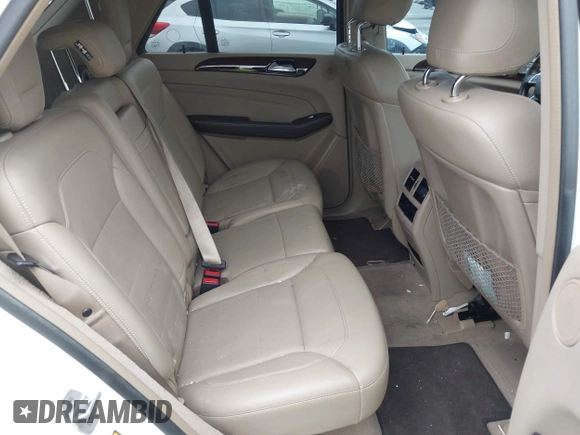 2014 Mercedes-Benz M 350 with VIN 4JGDA5JB2EA282733, listed as a IAAI auction lot 42070426 with 148,513 mi miles and . Bid and sale history available at DreamBid. Image 8.