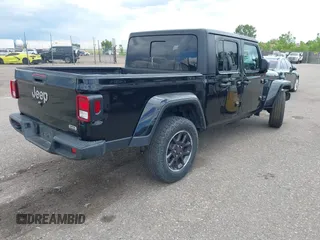 2023 Jeep Gladiator High Altitude z VIN 1C6HJTFG5PL552826, wystawiony jako IAAI lot #42288319 z przebiegiem 55 165 mil mil oraz . Historia ofert i sprzedaży dostępna na DreamBid. Obrazek 4.