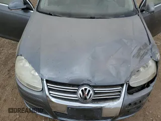 2008 Volkswagen Jetta SE z VIN 3VWRM71K08M099347, wystawiony jako Copart lot #57061795 z przebiegiem 129 225 mil mil oraz Szkoda całkowita • Salvage title. Historia ofert i sprzedaży dostępna na DreamBid. Obrazek 11.