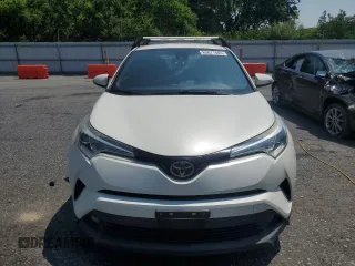 2018 Toyota C-HR XLE with VIN NMTKHMBX6JR027395, listed as a Copart auction lot 63071605 with 124,293 mi miles and Clean title. Bid and sale history available at DreamBid. Image 5.