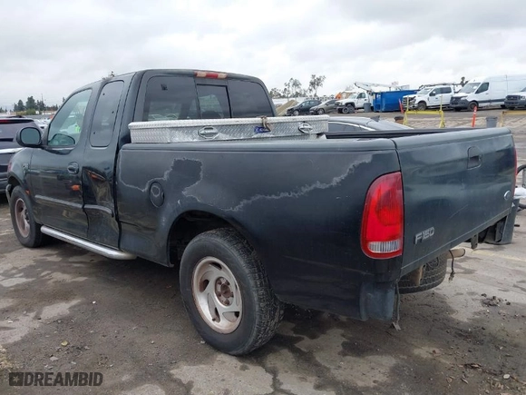 1999 Ford F-150 Work Series with VIN 1FTZX1720XKA54784, listed as a IAAI auction lot 41572757 with NaN miles. Bid and sale history available at carsss.com. Image 3.