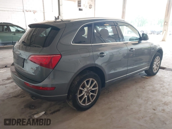 2012 Audi Q5 Premium Plus with VIN WA1LFAFP1CA118797, listed as a IAAI auction lot 42421201 with 103,079 mi miles and . Bid and sale history available at DreamBid. Image 4.