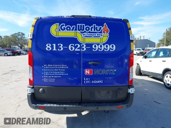 2020 Ford Transit Cargo with VIN 1FTBR1Y82LKB30997, listed as a IAAI auction lot 41293464 with 119,934 mi miles and . Bid and sale history available at DreamBid. Image 16.