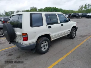 1995 Isuzu Trooper z VIN JACDJ58V9S7905213, wystawiony jako IAAI lot #42254823 z przebiegiem 210 377 mil mil oraz . Historia ofert i sprzedaży dostępna na DreamBid. Obrazek 4.