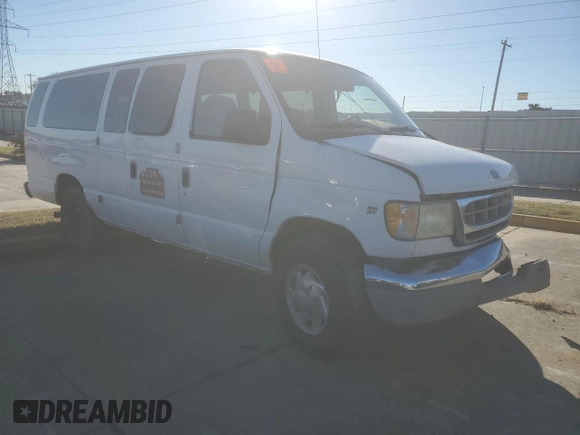 2002 Ford Econoline Passenger XL with VIN 1FBSS31S82HB36096, listed as a Copart auction lot 80654574 with 170,656 mi miles and Salvage title. Bid and sale history available at DreamBid. Image 4.